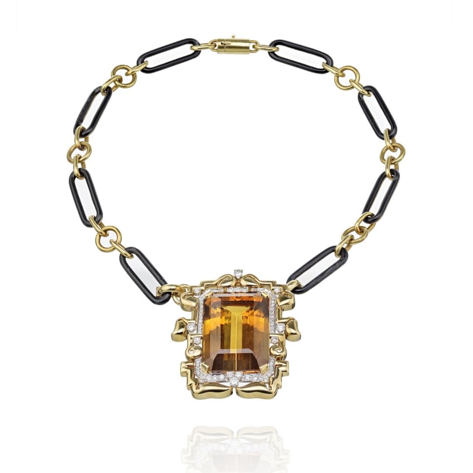 David Webb 1980s Topaz Diamond Brooch Necklace Platinum 18K Yellow Gold: David Webb 1980s Topaz Diamond Brooch Necklace Platinum 18K Yellow Gold Discover the exquisite craftsmanship of this David Webb large topaz and diamond pendant, elegantly set on a black enamel link ne
