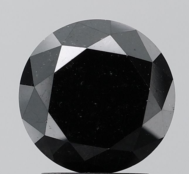 Loose Diamond - ROUND 2.93ct Fancy Black VVS2: Loose Diamond - ROUND 2.93ct Fancy Black VVS2 Source: Natural Shape: ROUND Carats: 2.93 Color: Fancy Black Certification: NONE Video: