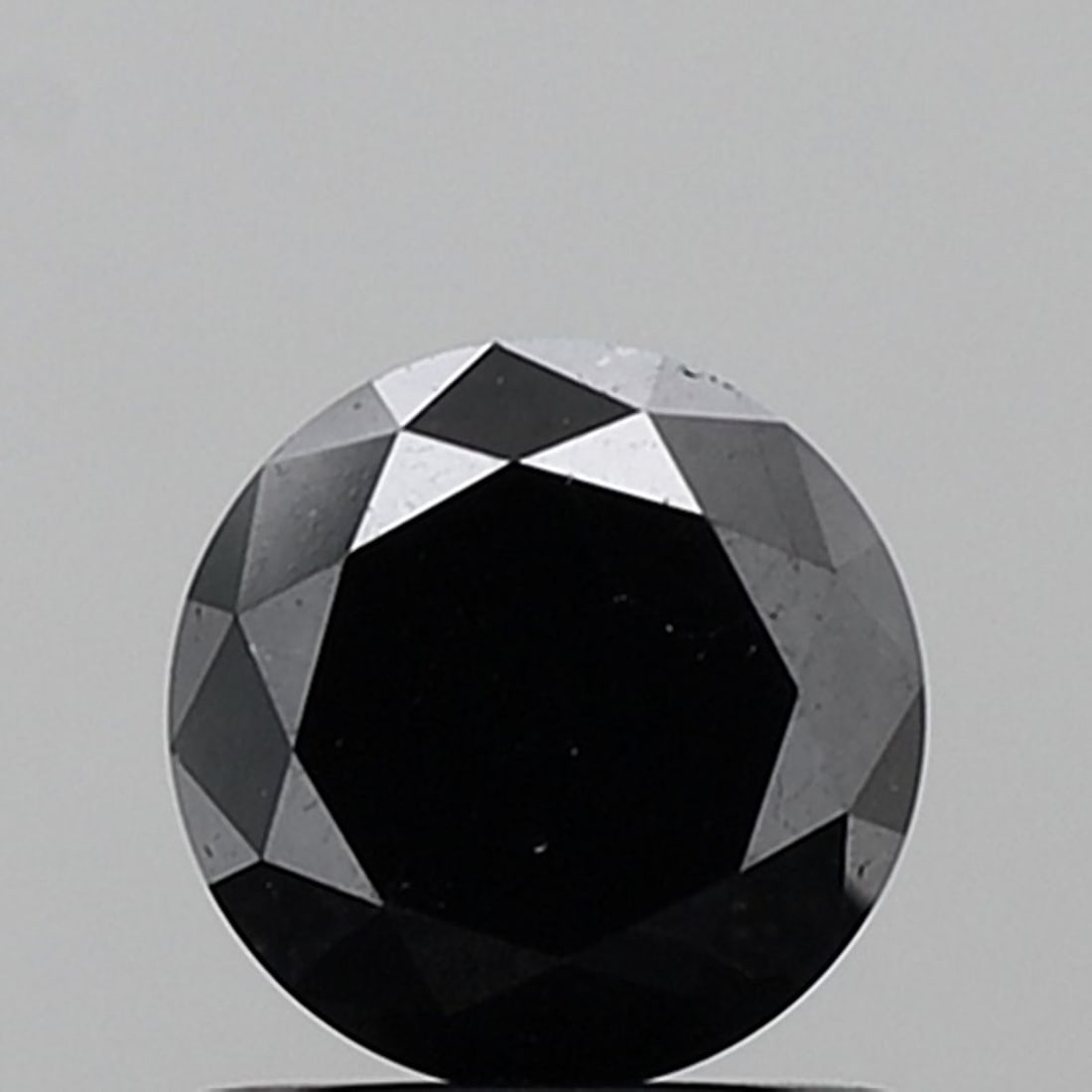 Loose Diamond - ROUND 1.29ct Fancy Black VVS2: Loose Diamond - ROUND 1.29ct Fancy Black VVS2 Source: Natural Shape: ROUND Carats: 1.29 Color: Fancy Black Certification: NONE Video: