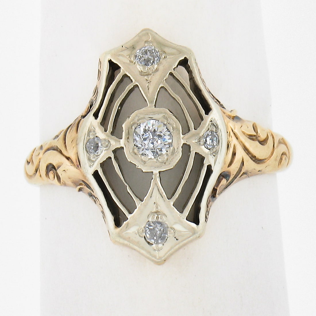 Antique Edwardian 14k Two Tone Gold Diamond Filigree Ring 0.10ctw: Antique Edwardian 14k Two Tone Gold Diamond Filigree Ring 0.10ctw This exquisite Antique Edwardian ring features a unique two-tone design crafted from solid 14k yellow gold with a white gold top. It s
