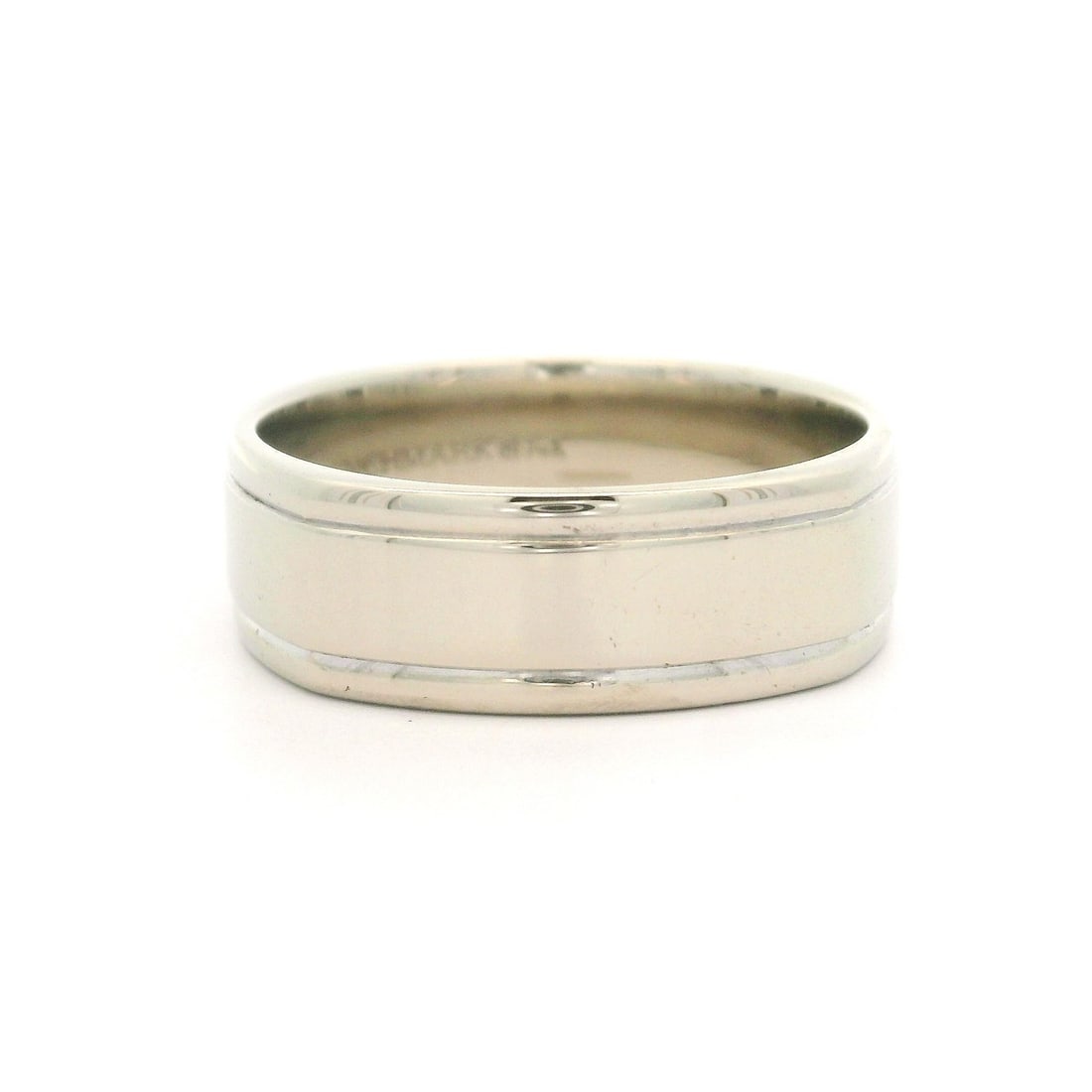 Benchmark 14k White Gold 6.8mm Polished Squared Band Ring Size 10: Benchmark 14k White Gold 6.8mm Polished Squared Band Ring Size 10 This elegant Benchmark band ring showcases a polished finish and is crafted from solid 14k white gold. With a substantial width of 6.8