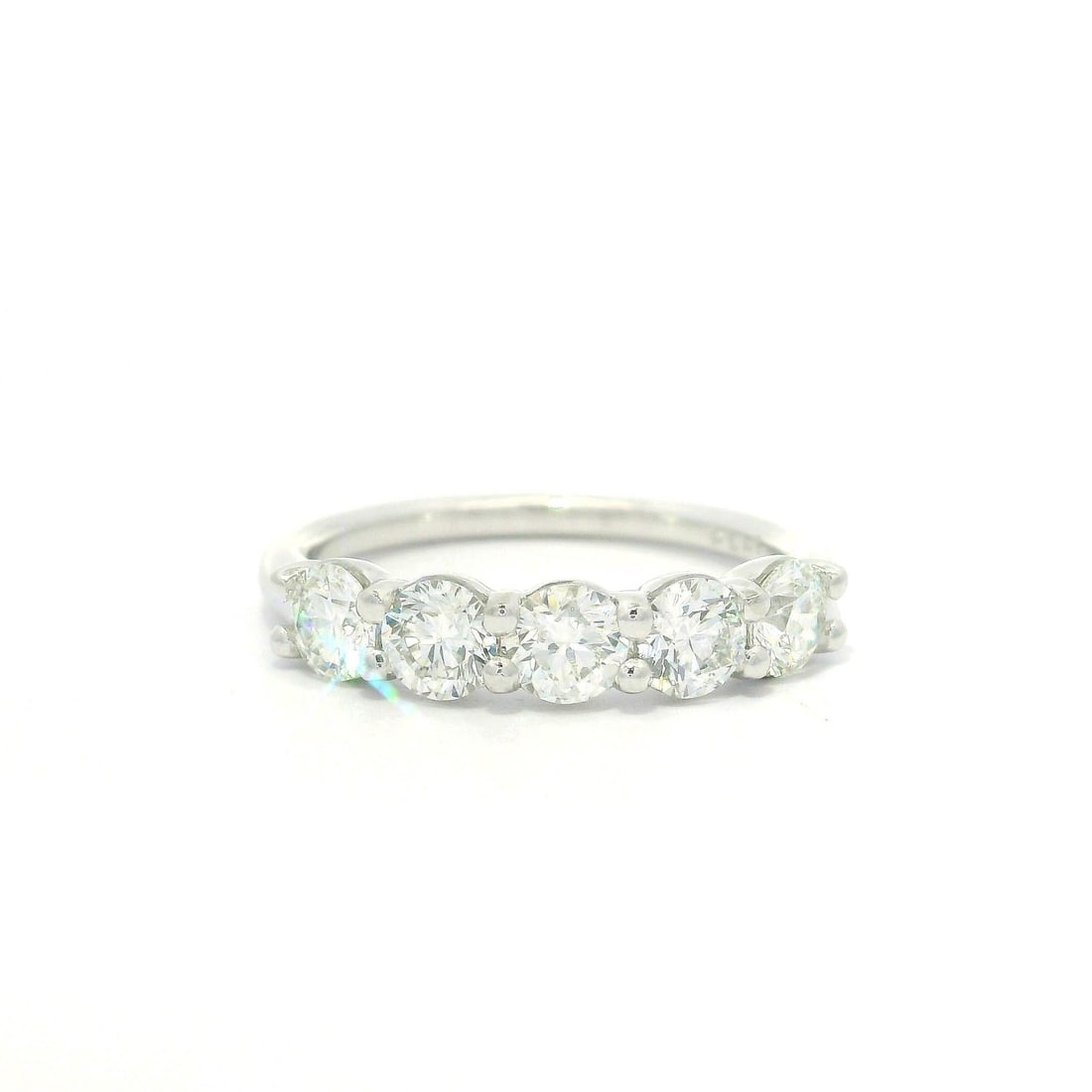 Classic 5 Stone Band Ring Platinum 1.24ctw Diamond VS2 H: Classic 5 Stone Band Ring Platinum 1.24ctw Diamond VS2 H This exquisite low-profile band ring showcases five round brilliant cut diamonds set in a shared prong design. Crafted from solid platinum, thi