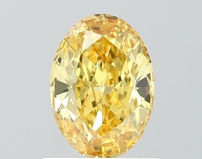 Loose Diamond - OVAL 0.89ct Fancy Vivid Yellow VS1: Loose Diamond - OVAL 0.89ct Fancy Vivid Yellow VS1 Source: This is a real non-mined Diamond that has been grown in a lab Shape: OVAL Carats: 0.89 Color: Fancy Vivid Yellow Certification: IGI The Diamo