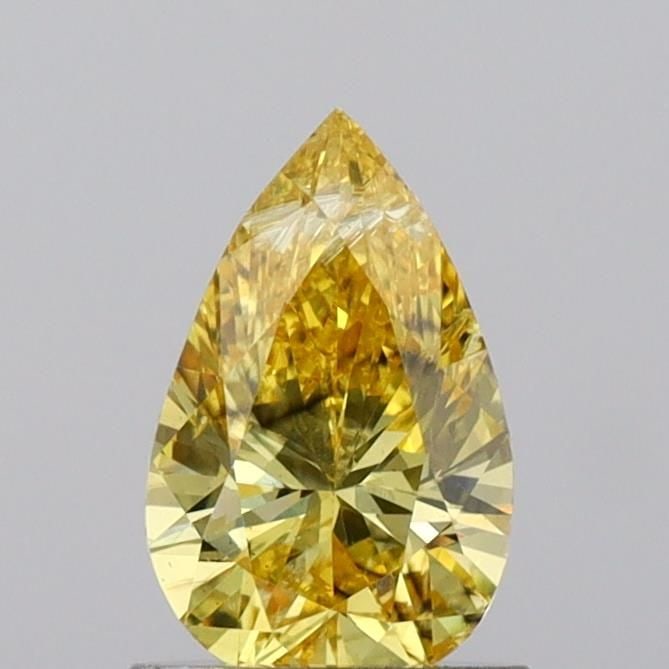 Loose Diamond - PEAR 0.99ct Fancy Vivid Yellow SI2: Loose Diamond - PEAR 0.99ct Fancy Vivid Yellow SI2 Source: This is a real non-mined Diamond that has been grown in a lab Shape: PEAR Carats: 0.99 Color: Fancy Vivid Yellow Certification: IGI Video: