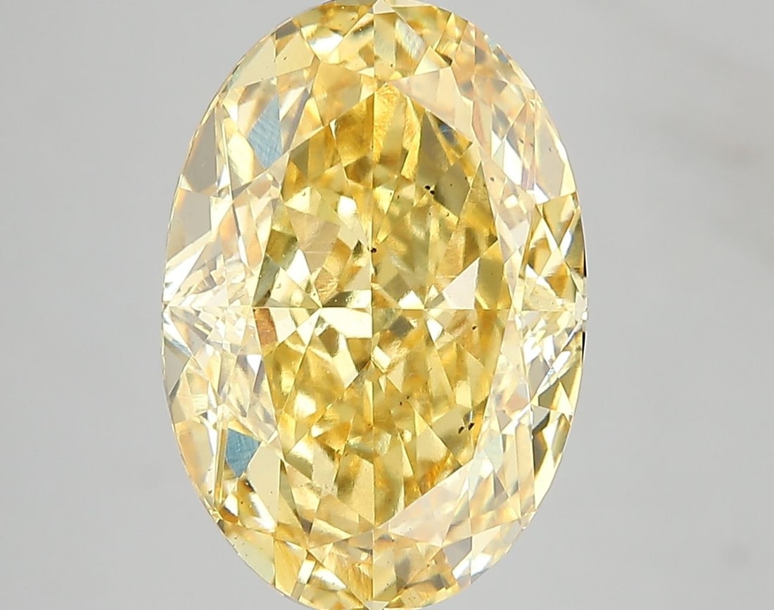 Loose Diamond - OVAL 7.07ct Fancy Vivid Yellow VS2: Loose Diamond - OVAL 7.07ct Fancy Vivid Yellow VS2 Source: This is a real non-mined Diamond that has been grown in a lab Shape: OVAL Carats: 7.07 Color: Fancy Vivid Yellow Certification: IGI Video: