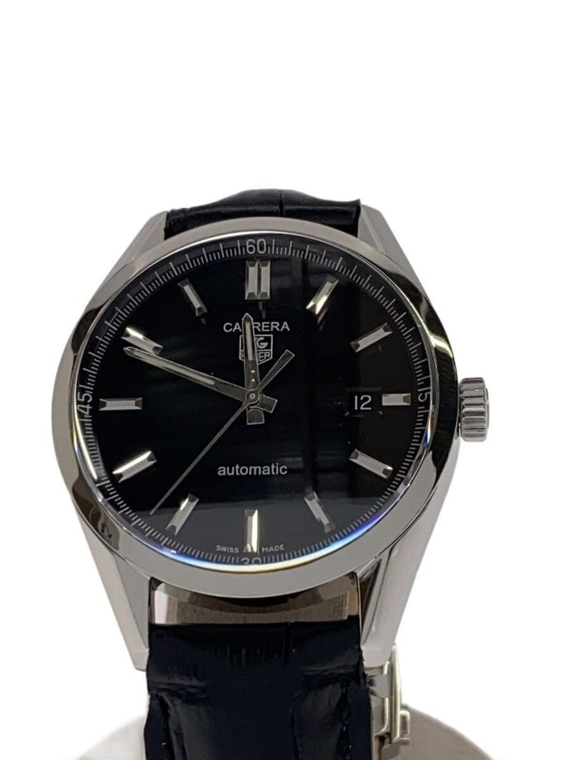 TAG Heuer Carrera Swiss Pre-Owned Wristwatch Non Original Strap: TAG Heuer Carrera Swiss Pre-Owned Wristwatch Non Original Strap This TAG Heuer Carrera men's wristwatch features a Swiss-made design and is equipped with a non-original strap. The watch shows slight s