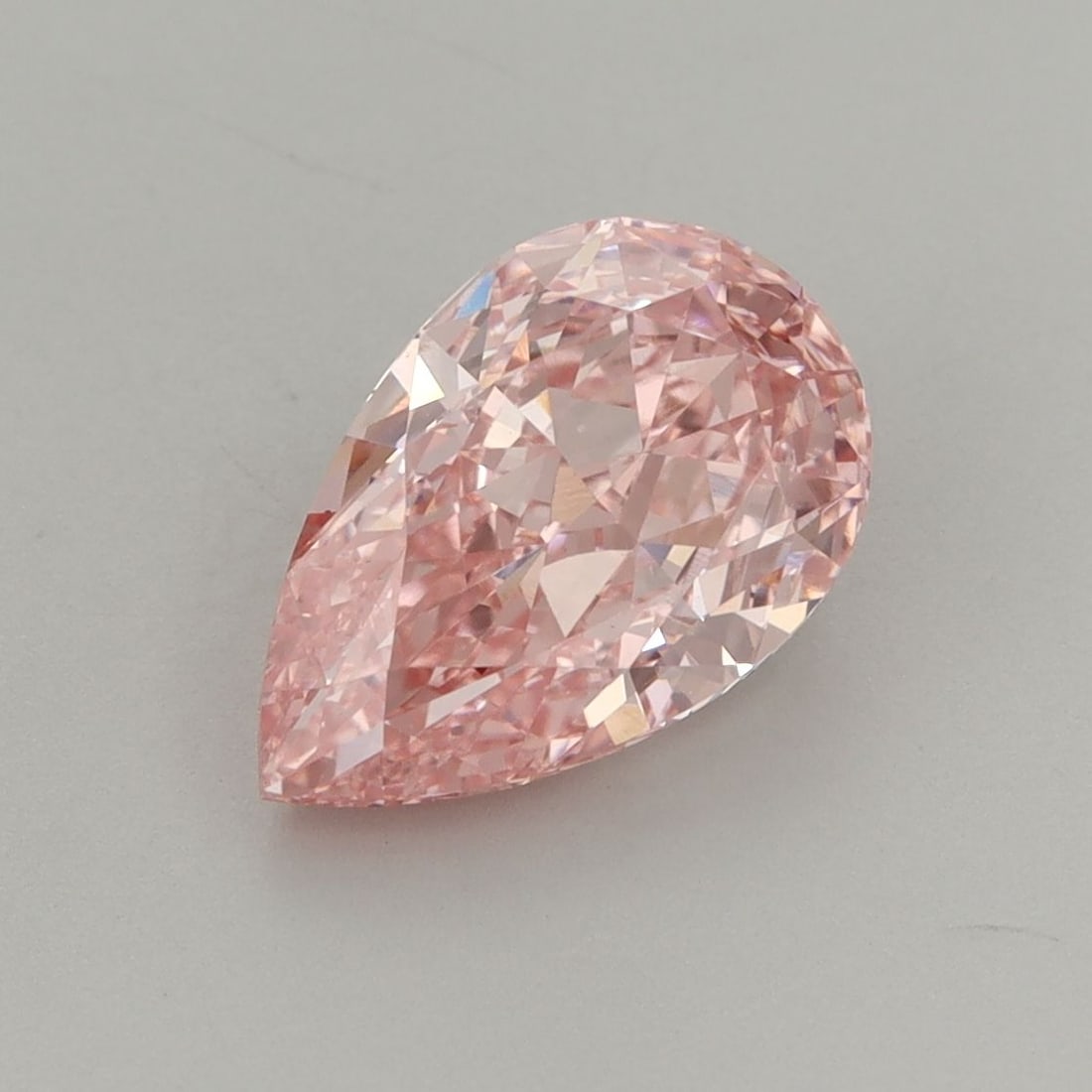 Loose Diamond - PEAR 2.1ct Fancy Vivid Pink VS1: Loose Diamond - PEAR 2.1ct Fancy Vivid Pink VS1 Source: This is a real non-mined Diamond that has been grown in a lab Shape: PEAR Carats: 2.1 Color: Fancy Vivid Pink Certification: IGI Video: