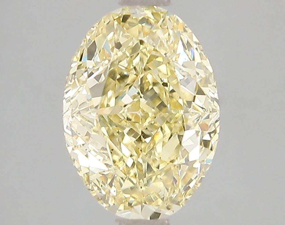 Loose Diamond - OVAL 3.04ct Fancy Vivid Yellow VS2: Loose Diamond - OVAL 3.04ct Fancy Vivid Yellow VS2 Source: This is a real non-mined Diamond that has been grown in a lab Shape: OVAL Carats: 3.04 Color: Fancy Vivid Yellow Certification: IGI Video: