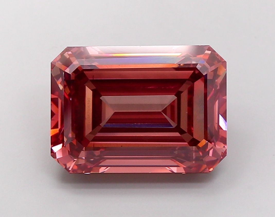 Loose Diamond - EMERALD 15.51ct Fancy Vivid Brownish Pink VS2: Loose Diamond - EMERALD 15.51ct Fancy Vivid Brownish Pink VS2 Source: This is a real non-mined Diamond that has been grown in a lab Shape: EMERALD Carats: 15.51 Color: Fancy Vivid Brownish Pink