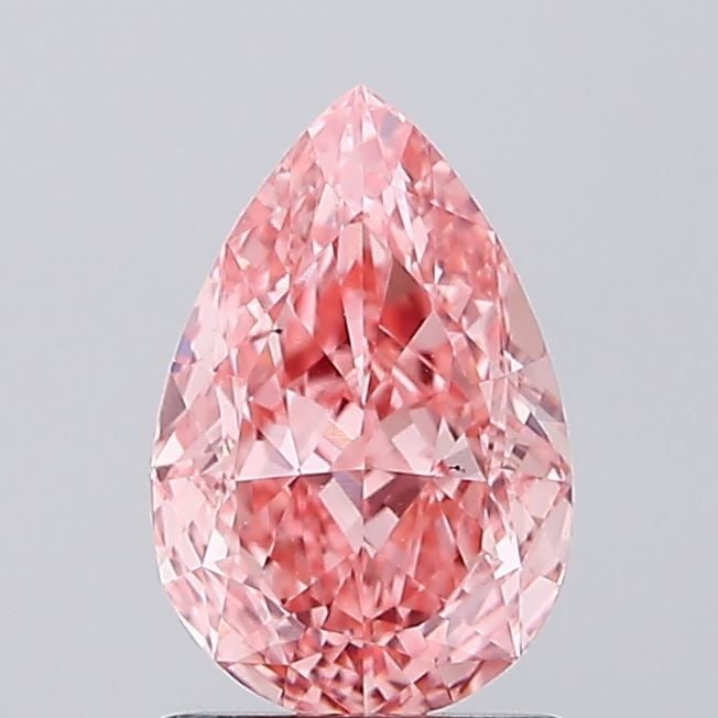 Loose Diamond - PEAR 1.28ct Fancy Vivid Pink VS1: Loose Diamond - PEAR 1.28ct Fancy Vivid Pink VS1 Source: This is a real non-mined Diamond that has been grown in a lab Shape: PEAR Carats: 1.28 Color: Fancy Vivid Pink Certification: IGI Video: