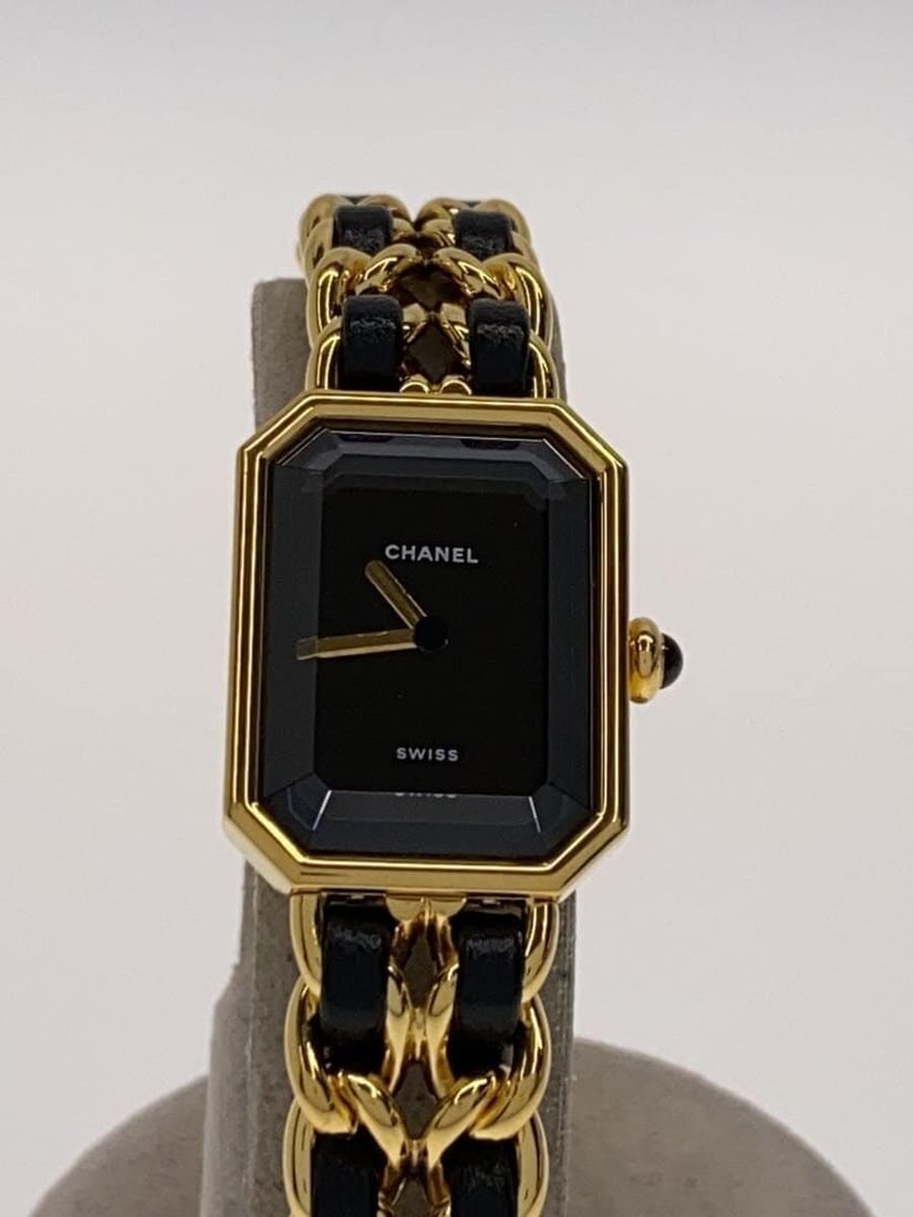 Chanel Premiere XL Swiss Black Wristwatch Aftermarket Strap: Chanel Premiere XL Swiss Black Wristwatch Aftermarket Strap This CHANEL Premiere XL women's wristwatch is a Swiss-made timepiece featuring a black color scheme. The watch displays slight signs of wear