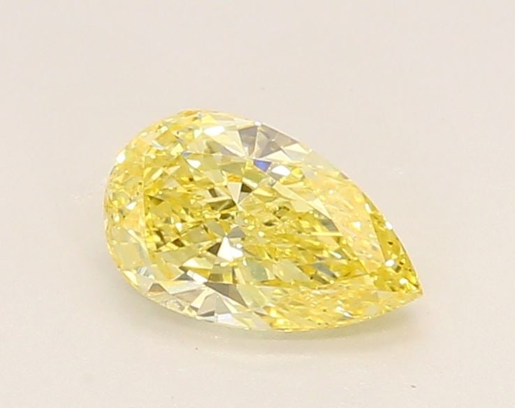 Loose Diamond - PEAR 0.7ct Fancy Intense Yellow VS2: Loose Diamond - PEAR 0.7ct Fancy Intense Yellow VS2 Source: This is a real non-mined Diamond that has been grown in a lab Shape: PEAR Carats: 0.7 Color: Fancy Intense Yellow Certification: IGI Video: