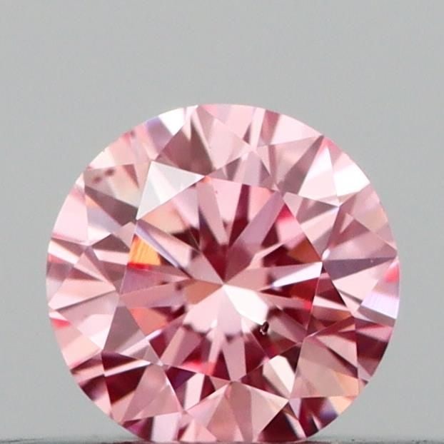 Ideal Loose Diamond - ROUND 0.21ct Fancy Vivid Pink VS2: Ideal Loose Diamond - ROUND 0.21ct Fancy Vivid Pink VS2 Source: This is a real non-mined Diamond that has been grown in a lab Shape: ROUND Carats: 0.21 Color: Fancy Vivid Pink Certification: IGI Video