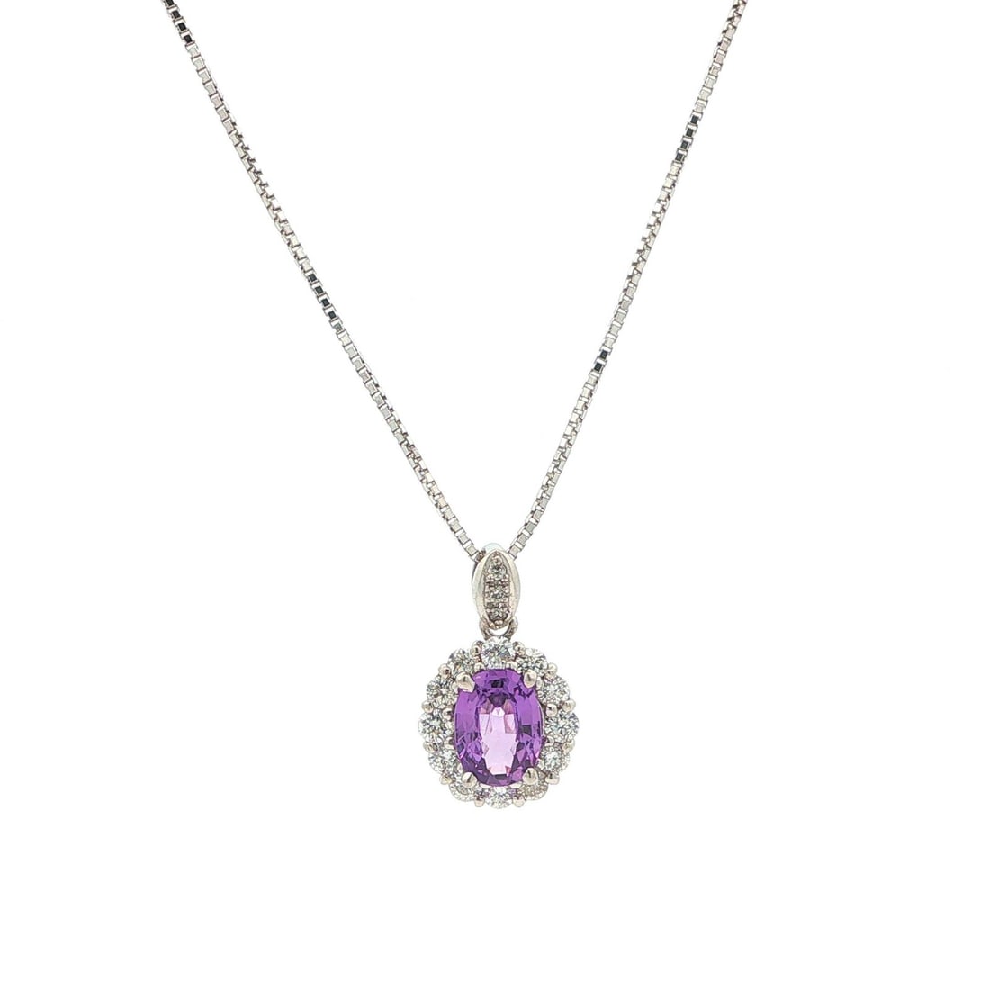GIA Certified Purple Sapphire Diamond Pendant in White Gold Necklace: GIA Certified Purple Sapphire Diamond Pendant in White Gold Necklace This pendant necklace features a natural, no-heat purple sapphire from Madagascar, certified by GIA. The oval brilliant-cut sapphir