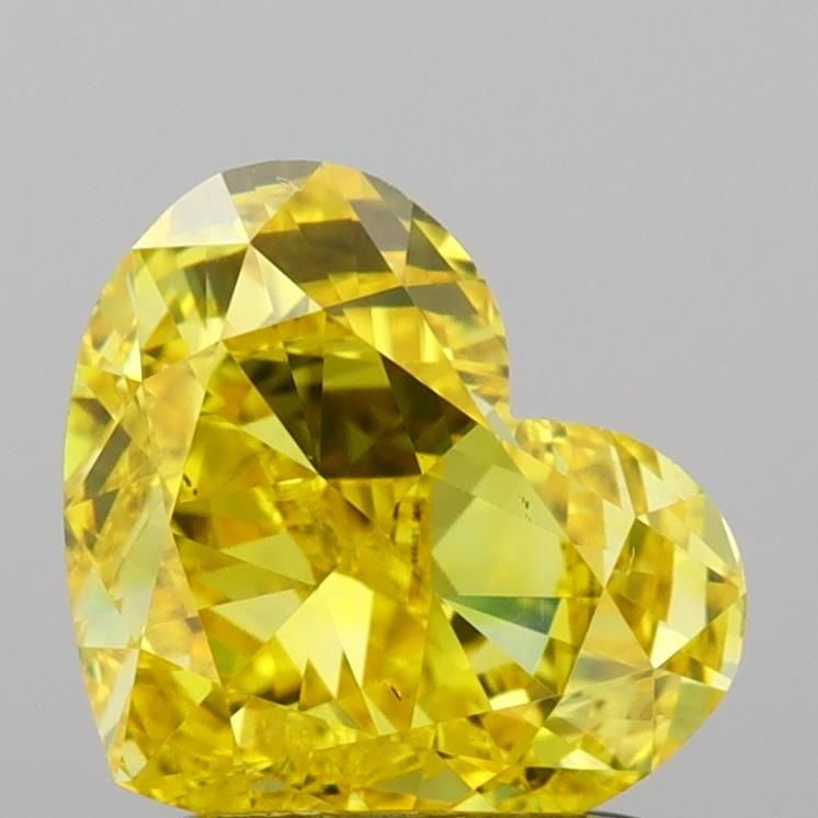 Loose Diamond - HEART 1.53ct Fancy Vivid Yellow VS2: Loose Diamond - HEART 1.53ct Fancy Vivid Yellow VS2 Source: This is a real non-mined Diamond that has been grown in a lab Shape: HEART Carats: 1.53 Color: Fancy Vivid Yellow Certification: IGI Video:
