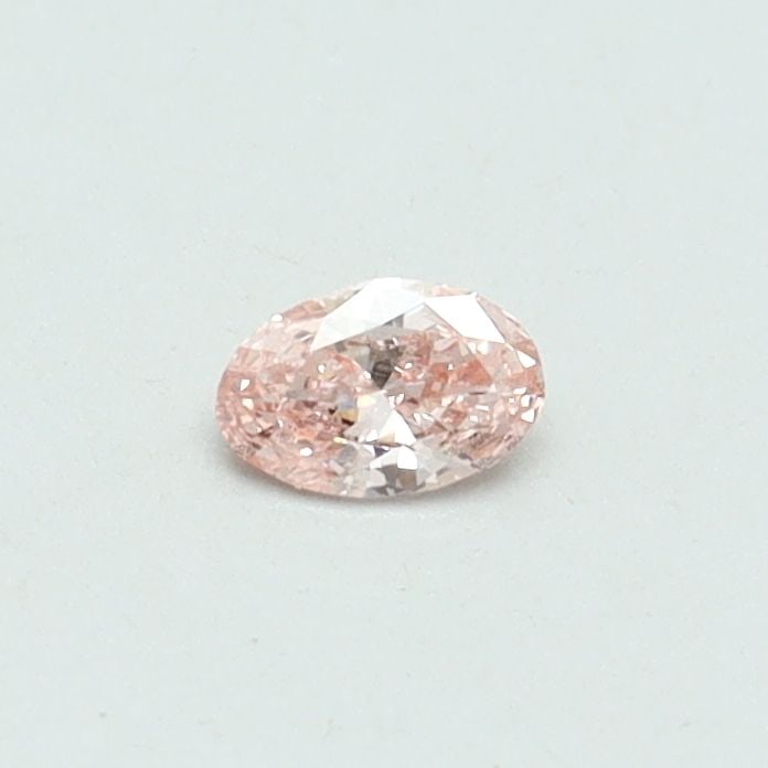 Loose Diamond - OVAL 0.11ct Fancy Vivid Pink VS2: Loose Diamond - OVAL 0.11ct Fancy Vivid Pink VS2 Source: This is a real non-mined Diamond that has been grown in a lab Shape: OVAL Carats: 0.11 Color: Fancy Vivid Pink Certification: IGI Video: