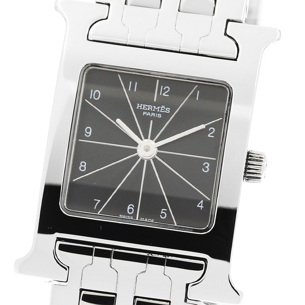 Hermes H-Watch HH1.210 Quartz Stainless Steel Women's Wristwatch: Hermes H-Watch HH1.210 Quartz Stainless Steel Women's Wristwatch This Hermes H-Watch HH1.210 is a pre-owned women's wristwatch featuring a stainless steel case and bracelet. The watch is powered by a 