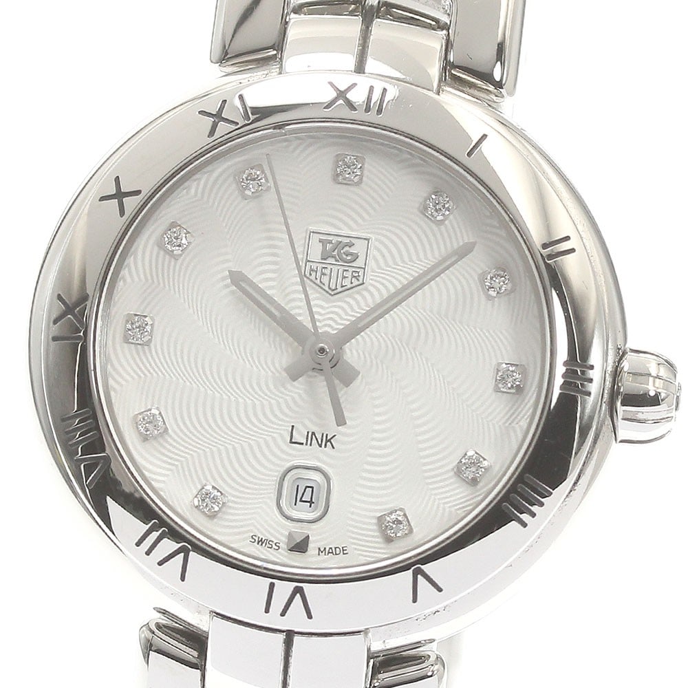TAG Heuer Link Quartz Stainless Steel Ladies Watch WAT1411.FC6316 Date: TAG Heuer Link Quartz Stainless Steel Ladies Watch WAT1411.FC6316 Date This TAG Heuer Link women's wristwatch features a stainless steel case and bracelet with a white dial. The watch operates on a qu