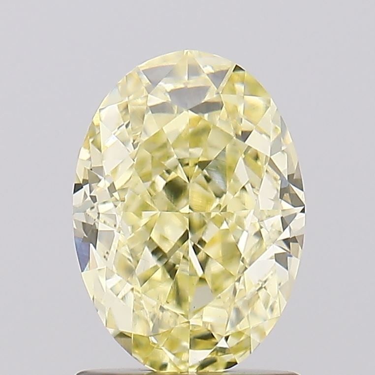 Loose Diamond - OVAL 1.52ct Fancy Yellow VS1: Loose Diamond - OVAL 1.52ct Fancy Yellow VS1 Source: This is a real non-mined Diamond that has been grown in a lab Shape: OVAL Carats: 1.52 Color: Fancy Yellow Certification: IGI Video: