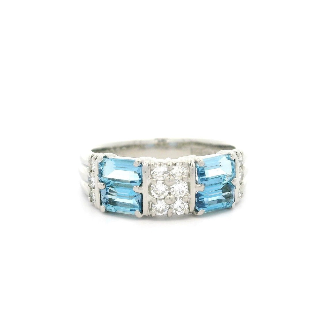 Platinum 1.37ctw Emerald Cut Aquamarine Diamond Band Ring: Platinum 1.37ctw Emerald Cut Aquamarine Diamond Band Ring This exquisite band ring features a stunning arrangement of natural gemstones, showcasing a total carat weight of 1.37ctw. The ring is adorned