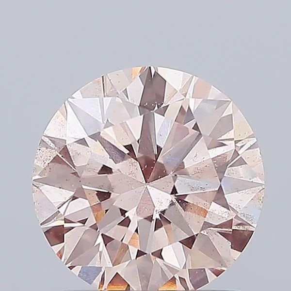 Loose Diamond - ROUND 1.5ct Fancy Pink SI1: Loose Diamond - ROUND 1.5ct Fancy Pink SI1 Source: This is a real non-mined Diamond that has been grown in a lab Shape: ROUND Carats: 1.5 Color: Fancy Pink Certification: IGI Video: