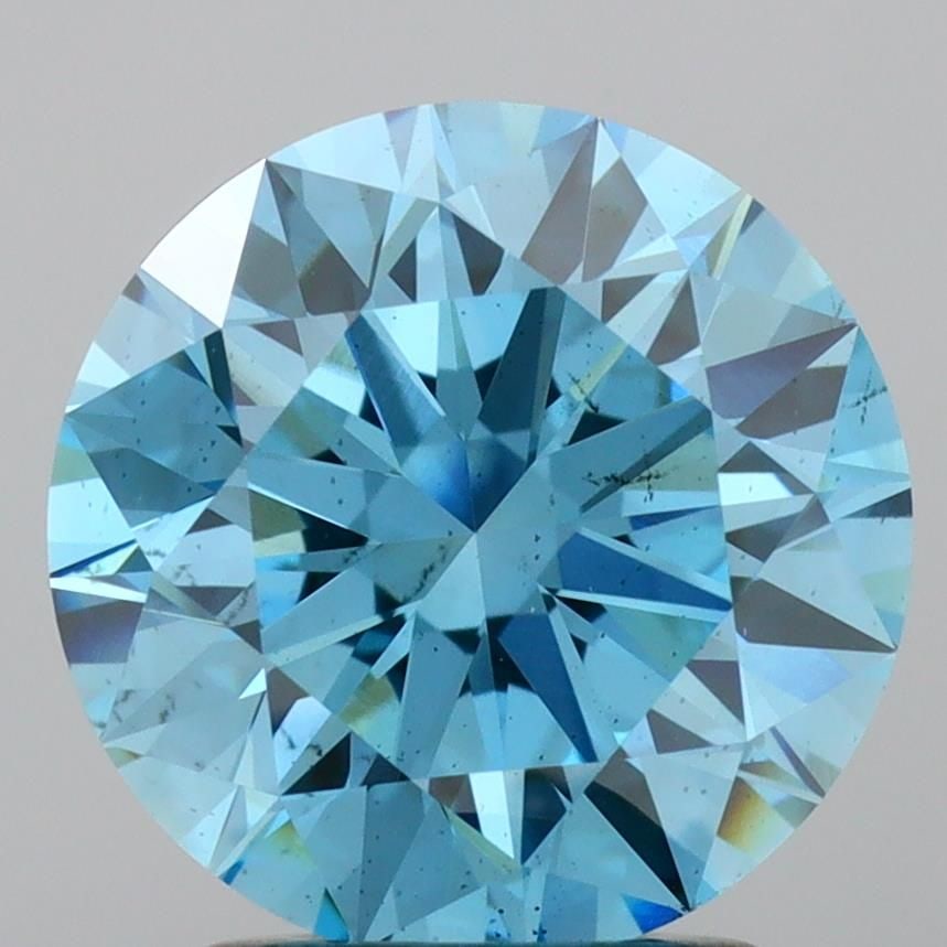 Ideal Loose Diamond - ROUND 2.21ct Fancy Vivid Blue SI1: Ideal Loose Diamond - ROUND 2.21ct Fancy Vivid Blue SI1 Source: This is a real non-mined Diamond that has been grown in a lab Shape: ROUND Carats: 2.21 Color: Fancy Vivid Blue Certification: IGI Video