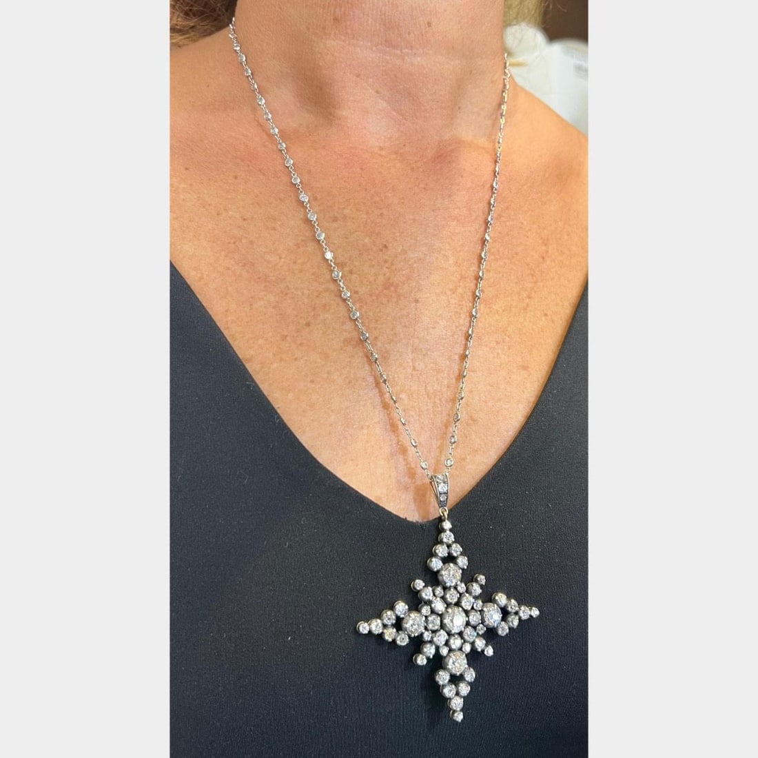18K Silver Top 12.10 Ct Diamond Pendant Necklace: 18K Silver Top 12.10 Ct Diamond Pendant Necklace This exquisite necklace features a stunning combination of 18K gold and silver, adorned with a total of 12.10 carats of dazzling diamonds. The piece we