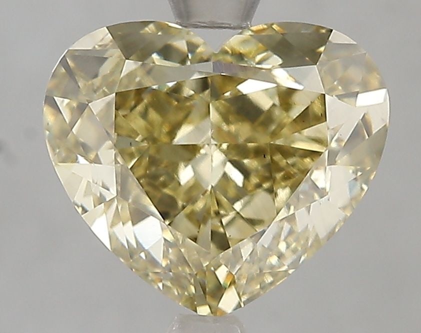Loose Diamond - HEART 4.0ct Fancy Yellow VS1: Loose Diamond - HEART 4.0ct Fancy Yellow VS1 Source: This is a real non-mined Diamond that has been grown in a lab Shape: HEART Carats: 4.0 Color: Fancy Yellow Certification: IGI Video: Video Link