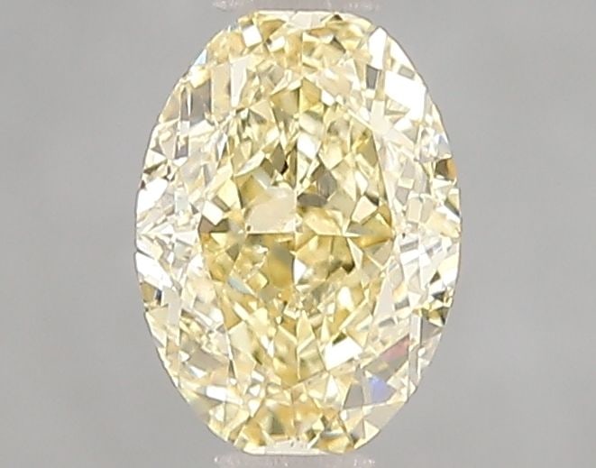 Loose Diamond - OVAL 1.0ct Fancy Yellow VS2: Loose Diamond - OVAL 1.0ct Fancy Yellow VS2 Source: This is a real non-mined Diamond that has been grown in a lab Shape: OVAL Carats: 1.0 Color: Fancy Yellow Certification: IGI Video:
