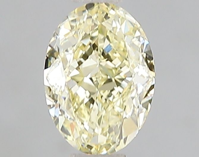 Loose Diamond - OVAL 1.0ct Fancy Yellow VS2: Loose Diamond - OVAL 1.0ct Fancy Yellow VS2 Source: This is a real non-mined Diamond that has been grown in a lab Shape: OVAL Carats: 1.0 Color: Fancy Yellow Certification: IGI The Diamond Depot Guara