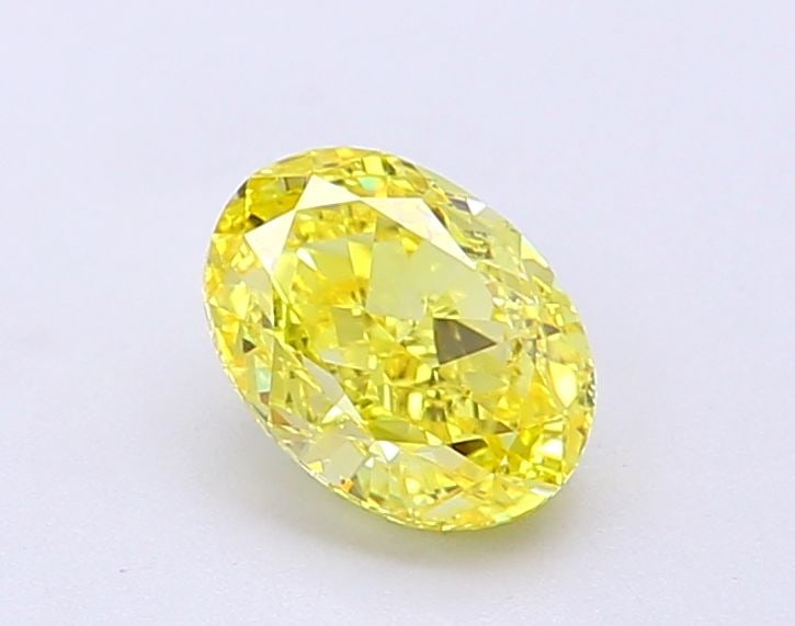 Loose Diamond - OVAL 1.0ct Fancy Vivid Yellow VVS1: Loose Diamond - OVAL 1.0ct Fancy Vivid Yellow VVS1 Source: This is a real non-mined Diamond that has been grown in a lab Shape: OVAL Carats: 1.0 Color: Fancy Vivid Yellow Certification: IGI Video: