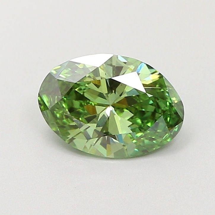 Loose Diamond - OVAL 0.87ct Fancy Vivid Green VS2: Loose Diamond - OVAL 0.87ct Fancy Vivid Green VS2 Source: This is a real non-mined Diamond that has been grown in a lab Shape: OVAL Carats: 0.87 Color: Fancy Vivid Green Certification: IGI Video: