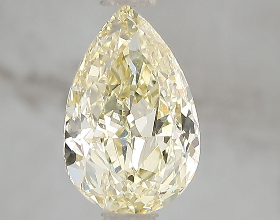 Loose Diamond - PEAR 2.03ct Fancy Intense Yellow VS1: Loose Diamond - PEAR 2.03ct Fancy Intense Yellow VS1 Source: This is a real non-mined Diamond that has been grown in a lab Shape: PEAR Carats: 2.03 Color: Fancy Intense Yellow Certification: IGI Video