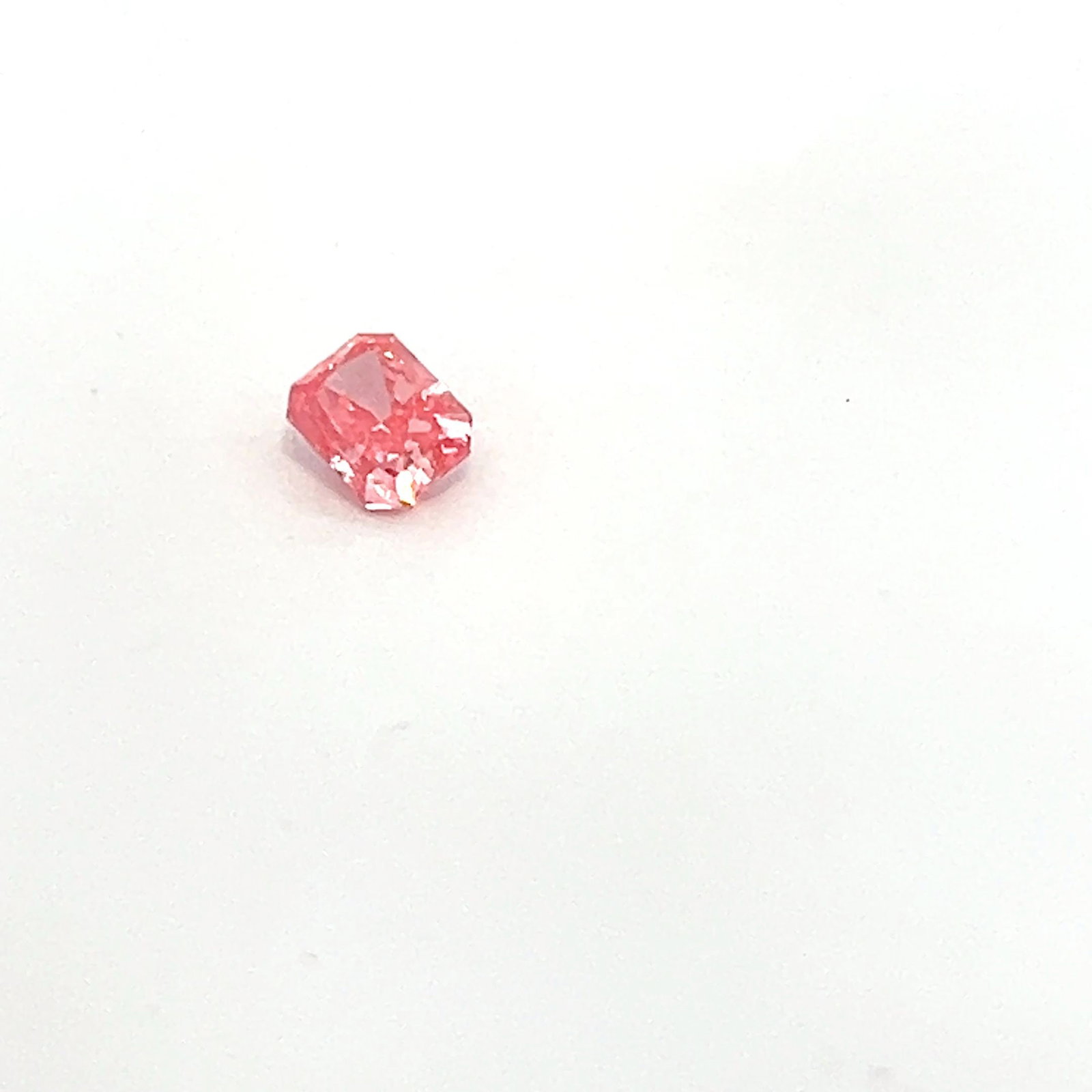 Loose Diamond - RADIANT 0.57ct Fancy Pink VVS2: Loose Diamond - RADIANT 0.57ct Fancy Pink VVS2 Source: This is a real non-mined Diamond that has been grown in a lab Shape: RADIANT Carats: 0.57 Color: Fancy Pink Certification: NONE The Diamond Depot