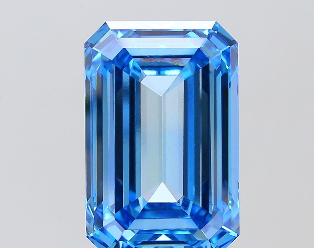 Loose Diamond - EMERALD 11.07ct Fancy Vivid Blue VVS2: Loose Diamond - EMERALD 11.07ct Fancy Vivid Blue VVS2 Source: This is a real non-mined Diamond that has been grown in a lab Shape: EMERALD Carats: 11.07 Color: Fancy Vivid Blue Certification: IGI Vide