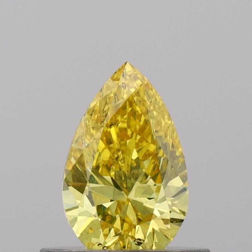 Loose Diamond - PEAR 0.51ct Fancy Vivid Yellow SI1: Loose Diamond - PEAR 0.51ct Fancy Vivid Yellow SI1 Source: This is a real non-mined Diamond that has been grown in a lab Shape: PEAR Carats: 0.51 Color: Fancy Vivid Yellow Certification: IGI Video: