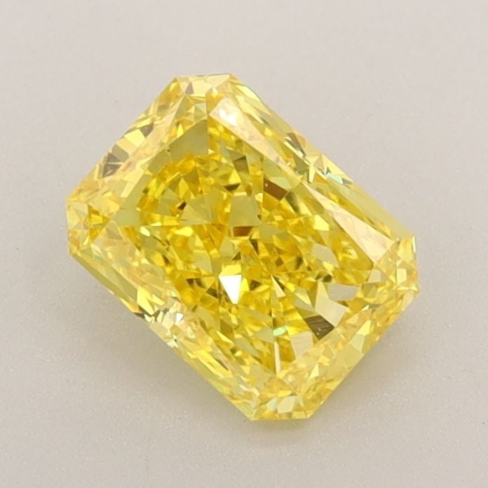 Loose Diamond - RADIANT 0.9ct Fancy Vivid Yellow VVS1: Loose Diamond - RADIANT 0.9ct Fancy Vivid Yellow VVS1 Source: This is a real non-mined Diamond that has been grown in a lab Shape: RADIANT Carats: 0.9 Color: Fancy Vivid Yellow Certification: IGI Vide