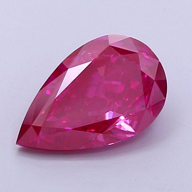 Loose Diamond - PEAR 1.55ct Fancy Vivid Pink VVS2: Loose Diamond - PEAR 1.55ct Fancy Vivid Pink VVS2 Source: This is a real non-mined Diamond that has been grown in a lab Shape: PEAR Carats: 1.55 Color: Fancy Vivid Pink Certification: IGI Video: