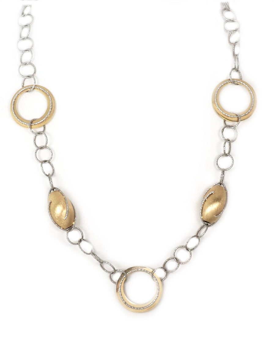 Vintage 14k Two Tone Gold Oval Bead Link Necklace: Vintage 14k Two Tone Gold Oval Bead Link Necklace This vintage necklace is crafted from 14k yellow and white gold, featuring polished oval beads and sculptural open ring links for a refined, textured 