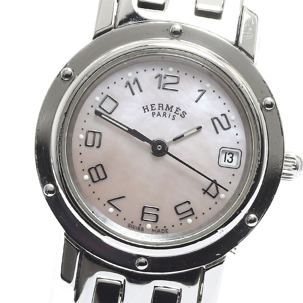 Hermes Clipper Date Quartz Stainless Steel Women's Wristwatch: Hermes Clipper Date Quartz Stainless Steel Women's Wristwatch This Hermes CL4.210 Clipper Date Quartz women's wristwatch features a stainless steel case and bracelet with a pink shell dial. The watch 