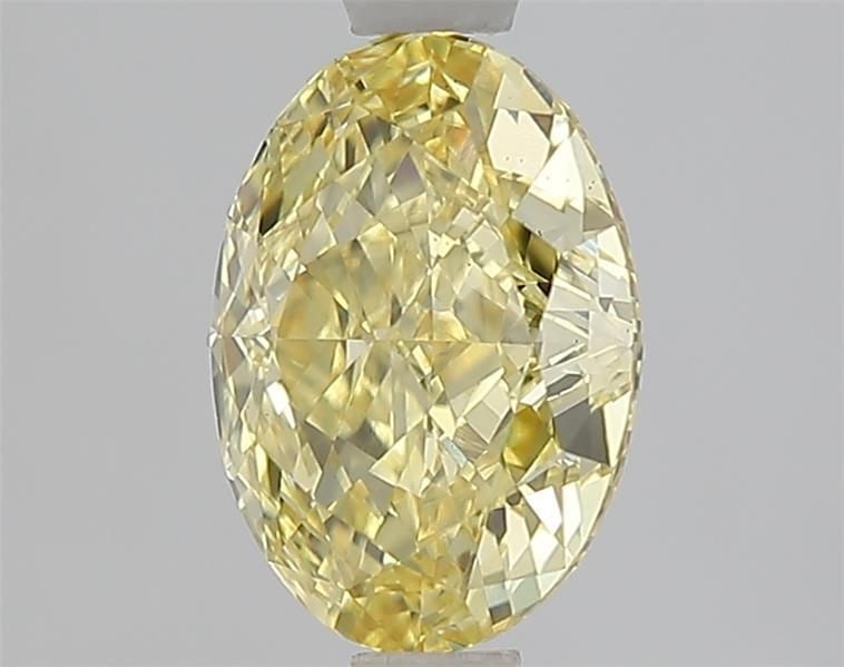 Loose Diamond - OVAL 1.57ct Fancy Vivid Yellow VS2: Loose Diamond - OVAL 1.57ct Fancy Vivid Yellow VS2 Source: This is a real non-mined Diamond that has been grown in a lab Shape: OVAL Carats: 1.57 Color: Fancy Vivid Yellow Certification: IGI Video: