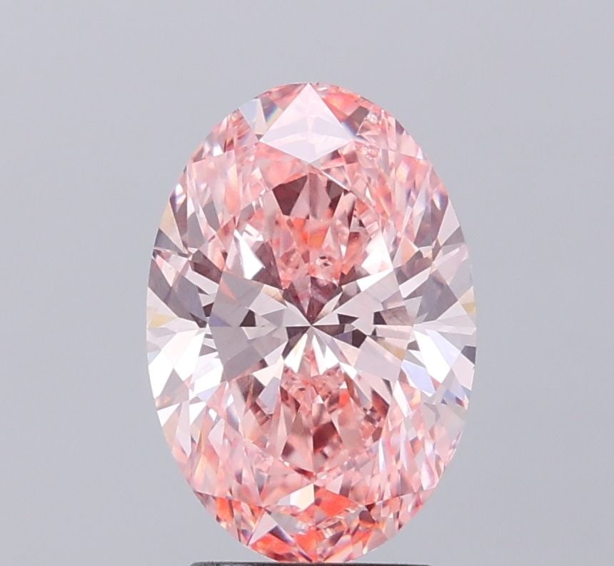 Loose Diamond - OVAL 3.0ct Fancy Vivid Pink VVS2: Loose Diamond - OVAL 3.0ct Fancy Vivid Pink VVS2 Source: This is a real non-mined Diamond that has been grown in a lab Shape: OVAL Carats: 3.0 Color: Fancy Vivid Pink Certification: IGI Video: