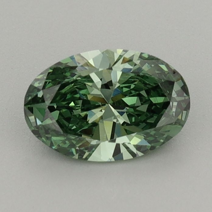 Loose Diamond - OVAL 0.71ct Fancy Vivid Green VVS2: Loose Diamond - OVAL 0.71ct Fancy Vivid Green VVS2 Source: This is a real non-mined Diamond that has been grown in a lab Shape: OVAL Carats: 0.71 Color: Fancy Vivid Green Certification: IGI Video:
