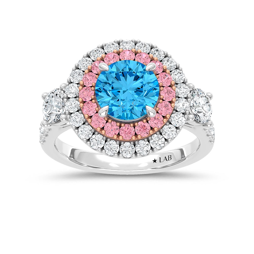 14K Two Tone Lab Grown Diamond 3 1/10 Ct.Tw. Blue Round Engagement Ring (Center 1 5/8ct): 14K Two Tone Lab Grown Diamond 3 1/10 Ct.Tw. Blue Round Engagement Ring (Center 1 5/8ct) Exude sophistication with this 14K Two-Tone Gold Engagement Ring, featuring a striking 1 5/8-carat lab-grown bl