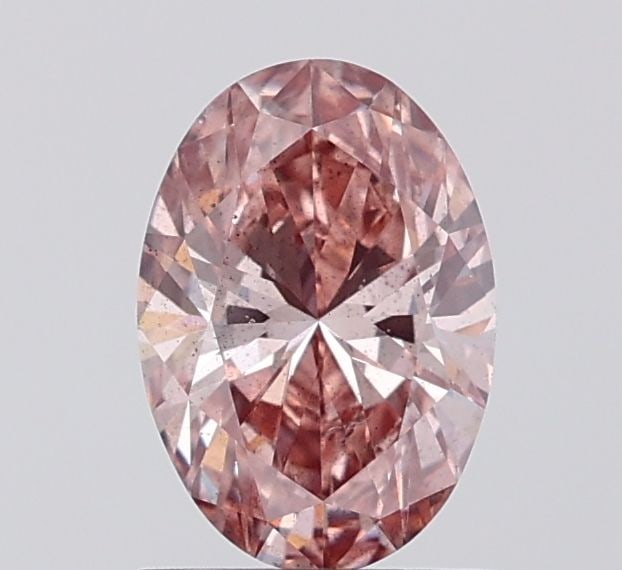 Loose Diamond - OVAL 1.03ct Fancy Pinkish Brown SI2: Loose Diamond - OVAL 1.03ct Fancy Pinkish Brown SI2 Source: This is a real non-mined Diamond that has been grown in a lab Shape: OVAL Carats: 1.03 Color: Fancy Pinkish Brown Certification: IGI Video: