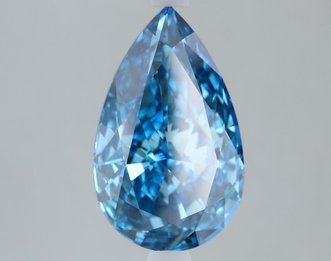 Loose Diamond - PEAR 3.02ct Fancy Vivid Blue VS1: Loose Diamond - PEAR 3.02ct Fancy Vivid Blue VS1 Source: This is a real non-mined Diamond that has been grown in a lab Shape: PEAR Carats: 3.02 Color: Fancy Vivid Blue Certification: IGI Video: