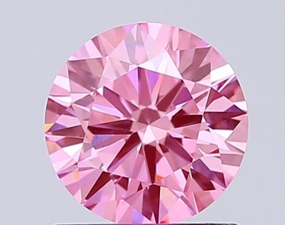 Ideal Loose Diamond - ROUND 0.98ct Fancy Vivid Pink VS1: Ideal Loose Diamond - ROUND 0.98ct Fancy Vivid Pink VS1 Source: This is a real non-mined Diamond that has been grown in a lab Shape: ROUND Carats: 0.98 Color: Fancy Vivid Pink Certification: IGI Video