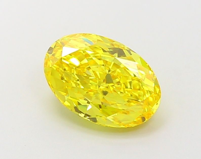 Loose Diamond - OVAL 1.79ct Fancy Vivid Yellow VS1: Loose Diamond - OVAL 1.79ct Fancy Vivid Yellow VS1 Source: This is a real non-mined Diamond that has been grown in a lab Shape: OVAL Carats: 1.79 Color: Fancy Vivid Yellow Certification: IGI Video: