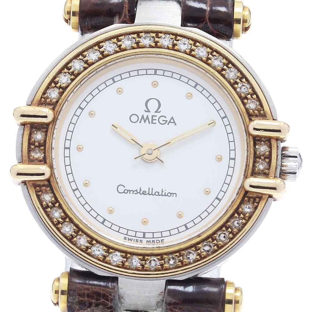 Omega Constellation Ladies Quartz Wristwatch White Dial SS YG: Omega Constellation Ladies Quartz Wristwatch White Dial SS YG This OMEGA Constellation Quartz women's wristwatch features a stainless steel and yellow gold case paired with a leather strap. The watch 