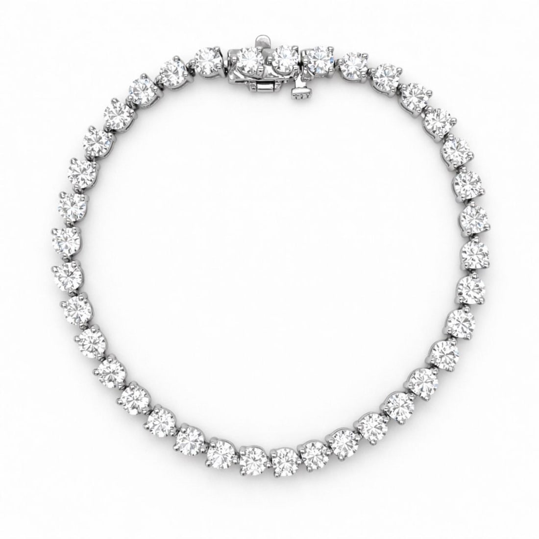 Diamond Tennis Bracelet 18K White Gold 6.65 Carat 6.75 Inch: Diamond Tennis Bracelet 18K White Gold 6.65 Carat 6.75 Inch This elegant tennis bracelet is crafted from 18K white gold and features 37 diamonds with a total weight of approximately 6.65 carats. The d